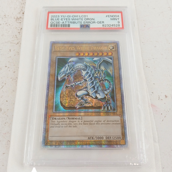Blue-Eyes White Dragon PSA 9 Mint 2023 YuGiOh QCSE Attribute Error LC01-EN004 - Picture 1 of 2